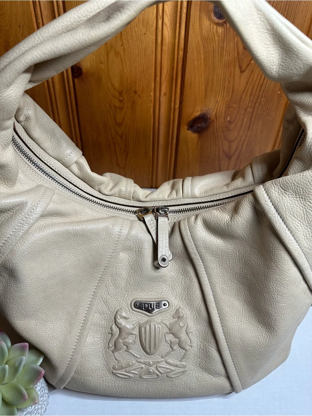 Cream Leather Shoulder Hobo Bag with Embossed Crest